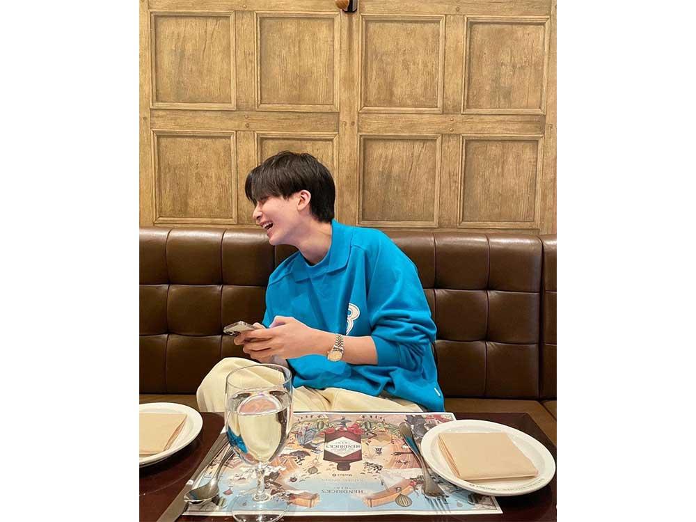 Happy, laughing black-haired Jeonghan