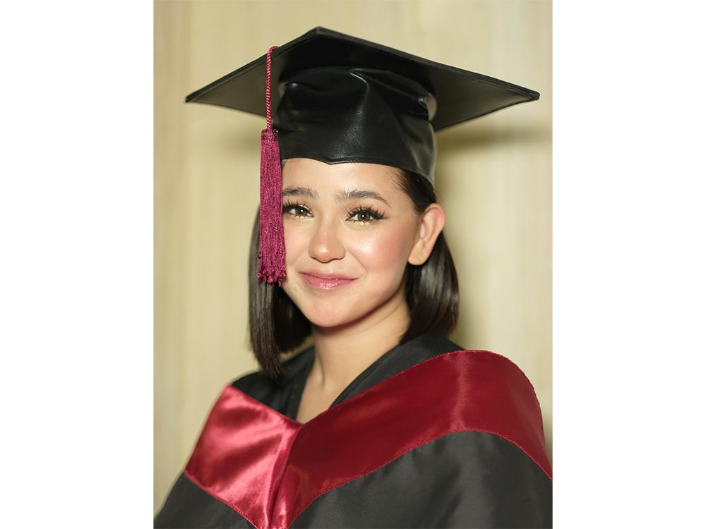 Mikee Quintos earns college degree after 10 years