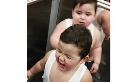 Baste and Samsam in elevator