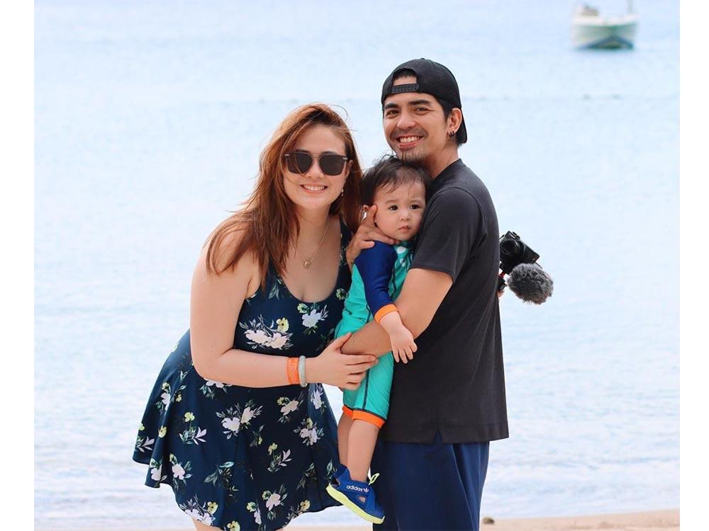 Family photo by the beach