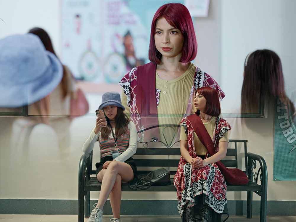 Yellow shirt and black long skirtÂ