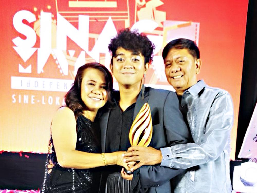Nar Cabico with his parents
