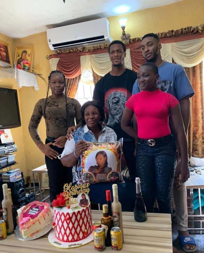 Divine Adili with his family