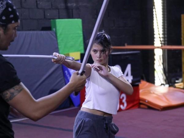 Bianca preparing for her role by learning sword fighting 