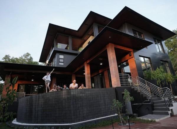 The Kramer family in their dream mansion