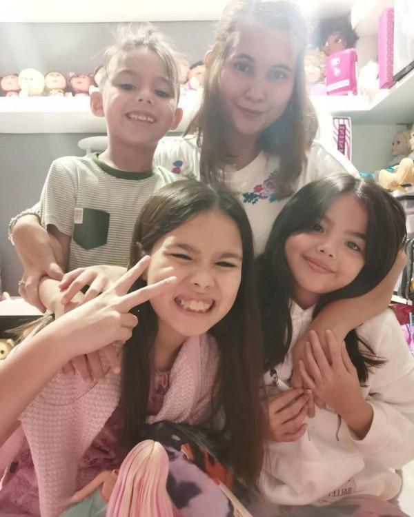 Teacher Raycyn Enriquez with Kendra Scarlett and Gavin