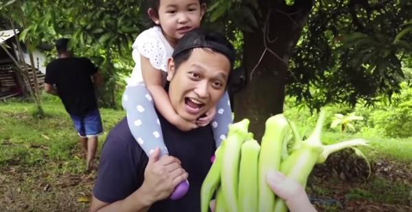 Camille Prats showing her okra produce