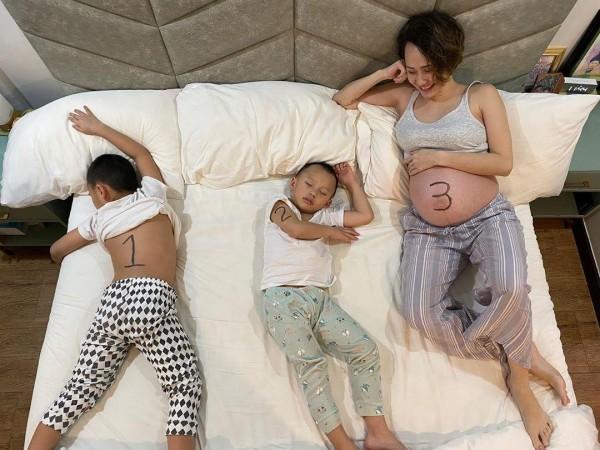 Pregnant Chariz Solomon with her two sons Apollo and Ali