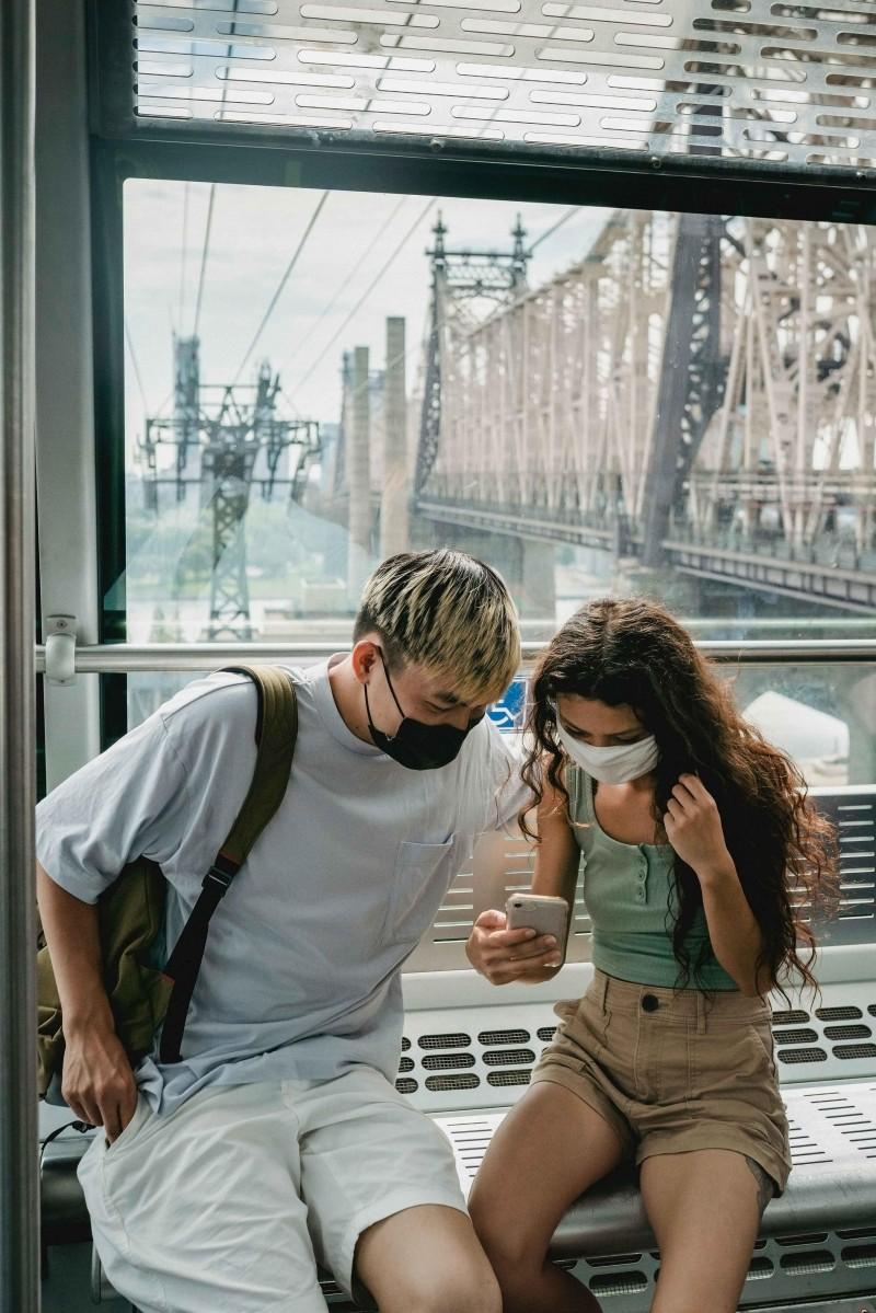 two people using a smart phone