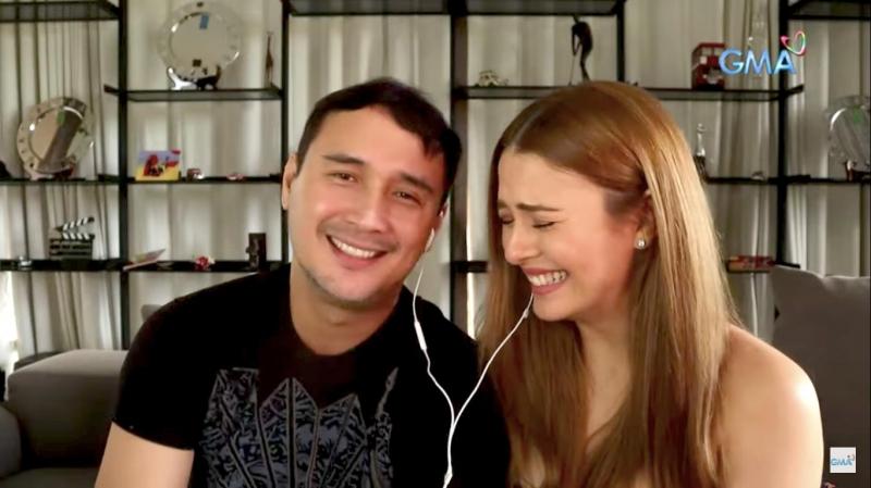 john and priscilla laughing  