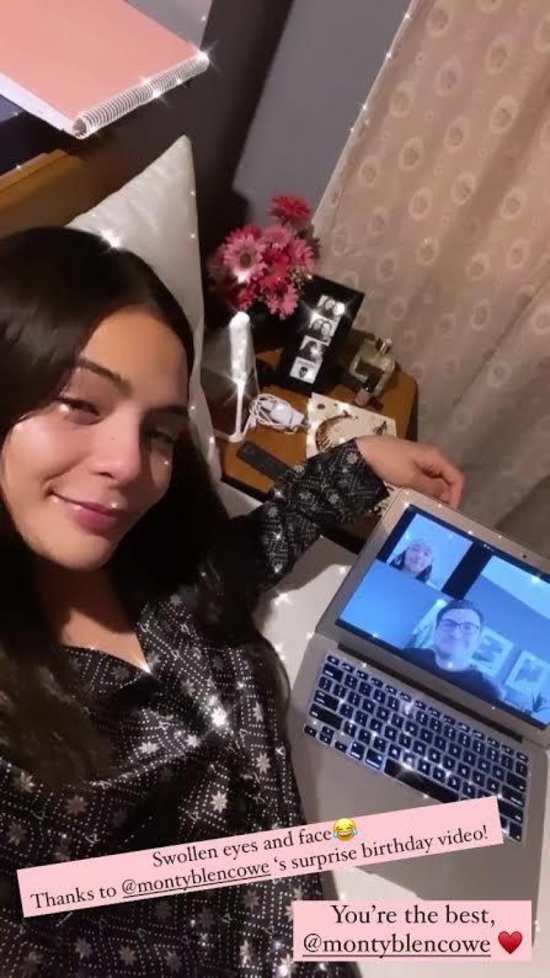 Lovi Poe watching on her laptop