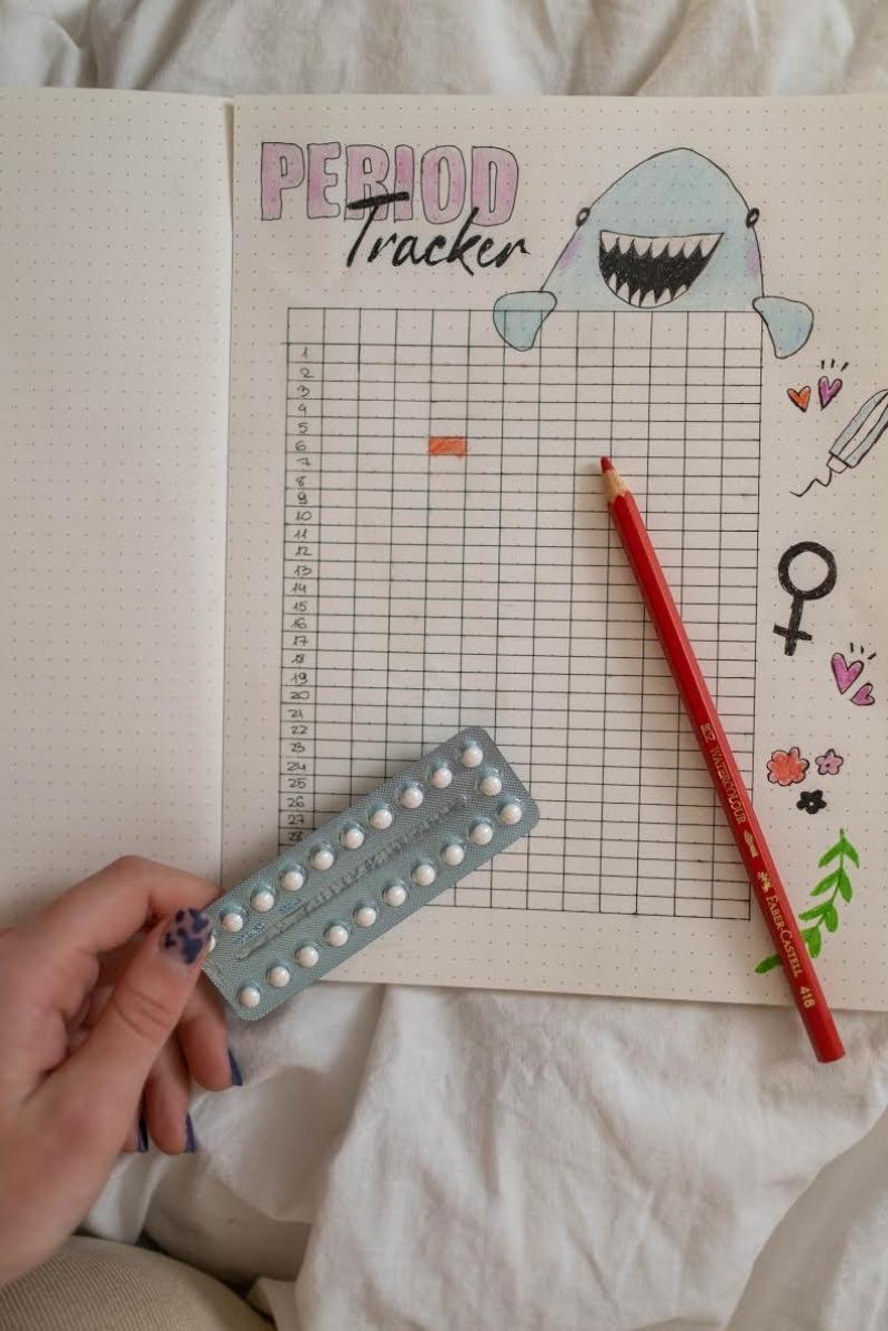 period tracker and pills