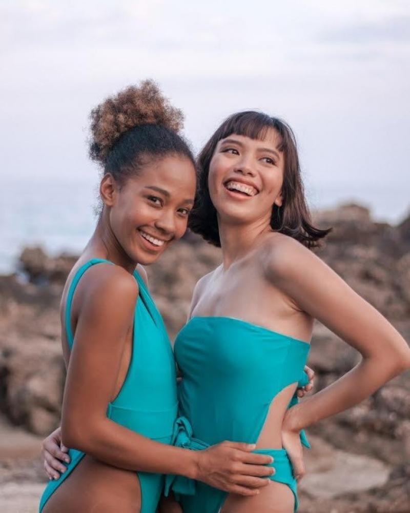 ladies in teal swimsuits