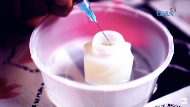 petroleum jelly and syringe